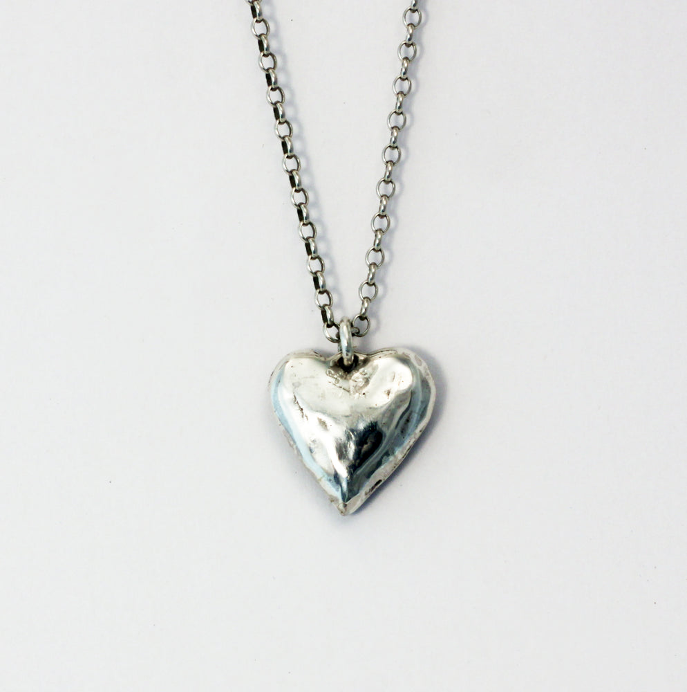 Little Heart pendant • sterling silver with        18k gold bezel set with   a natural facet ruby pendant necklace