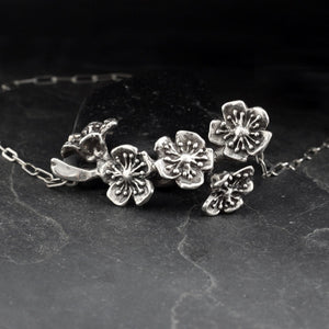 Blossoms on branch sterling silver pendant necklace