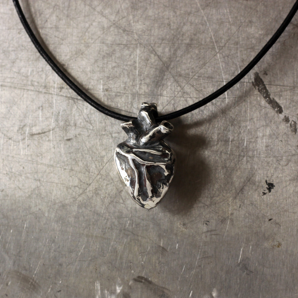 
            
                Load image into Gallery viewer, Anatomical Heart sterling silver pendant
            
        
