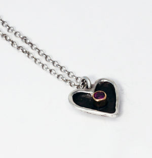 Little Heart pendant • sterling silver with        18k gold bezel set with   a natural facet ruby pendant necklace