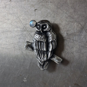 Owl with moonstone brooch