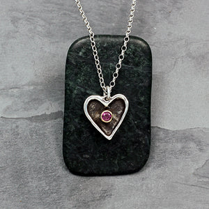 Little Heart pendant • sterling silver with        18k gold bezel set with   a natural facet ruby pendant necklace